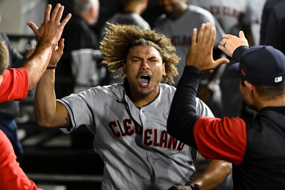 May 9: The Cleveland Guardians' Josh Naylor celebrates in the dugout after hitting a three-run home run against the Chicago White Sox during the eleventh inning at Guaranteed Rate Field. The Guardians won the game, 12-9, in 11 innings.