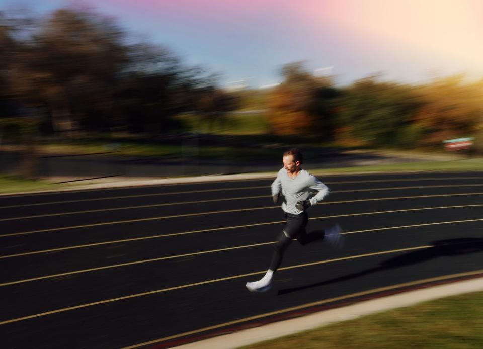 a person running on a road