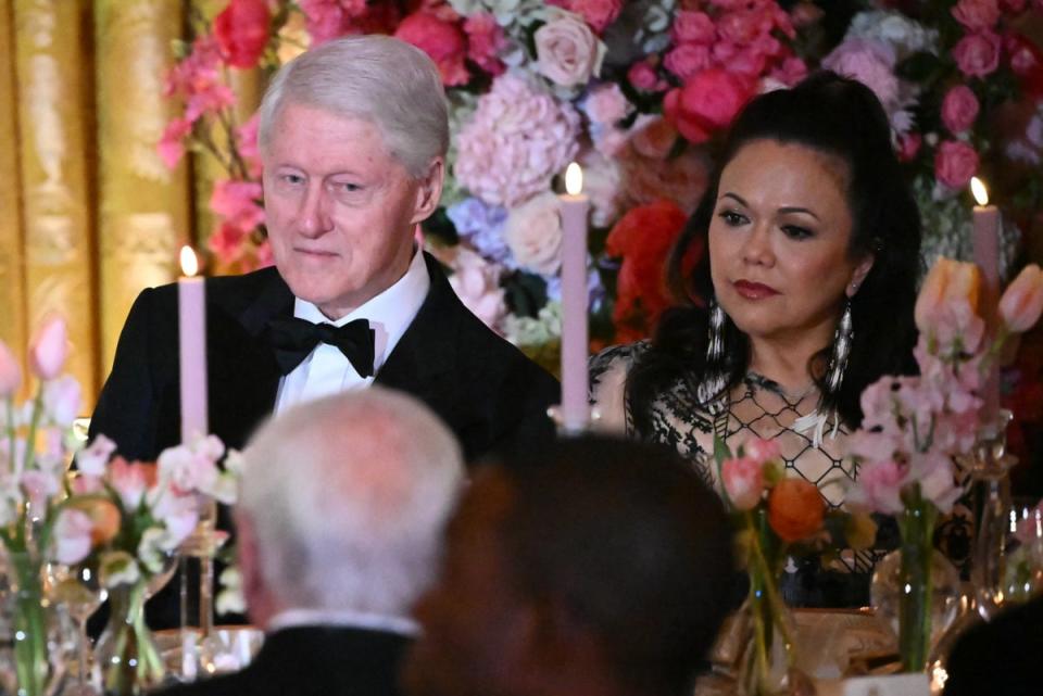 Former US president Bill Clinton attends a state dinner for Japanese prime minister Fumio Kishida and his wife Yuko Kishida (AFP via Getty Images)