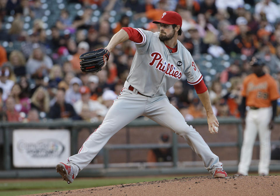 FILE - Philadelphia Phillies pitcher Cole Hamels throws to a San Francisco Giants batter during the first inning of a baseball game in San Francisco, July 10, 2015. Former World Series MVP and four-time All-Star Hamels has retired after his attempt at a comeback with his hometown San Diego Padres fell short. The Padres signed Hamels to a minor league contract in February. They announced his retirement, which agent John Boggs confirmed. (AP Photo/Jeff Chiu, File)