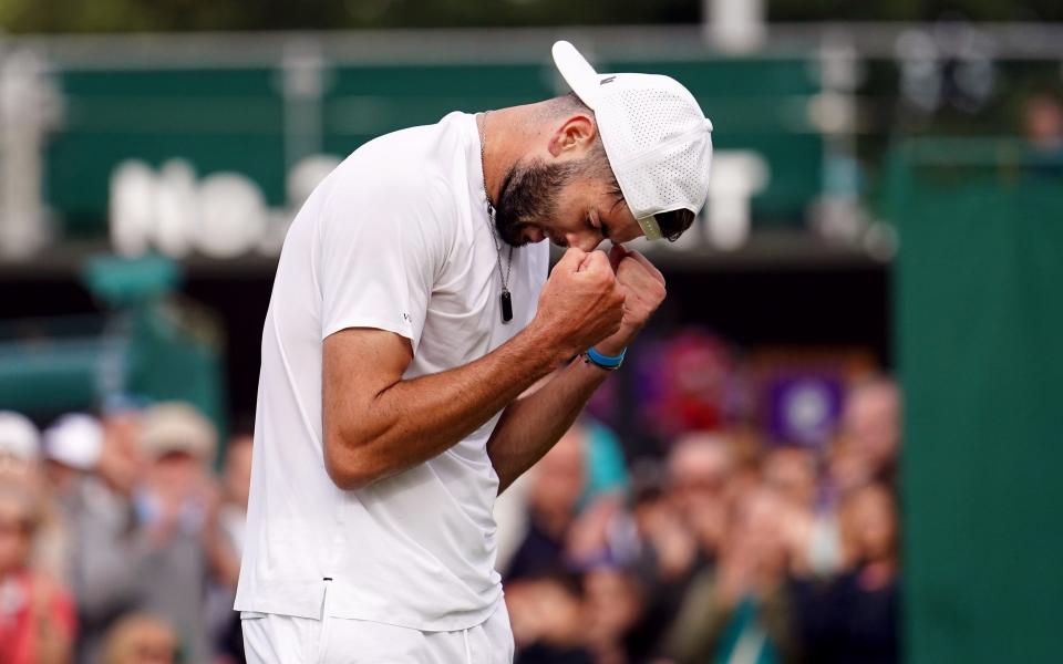 Jacob Fearnley celebrates beating Alejandro Moro Canas (not pictured) on day two of the 2024 Wimbledon Championships at the All England Lawn Tennis and Croquet Club, London