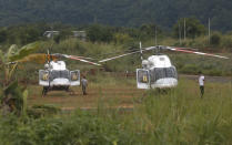 <p>Two helicopters wait near the cave for more evacuations of the boys and their soccer coach who had been trapped since June 23 in a deep cave in Chiang Rai province, northern Thailand, July 9, 2018. (Photo: Sakchai Lalit/AP) </p>