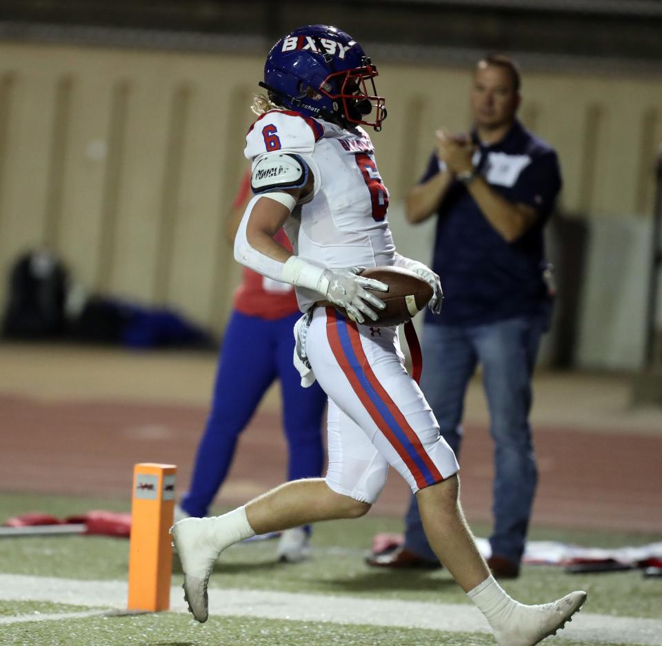 Bixby's Jett Turner scores a touchdown against Westmoore Friday night in Moore.