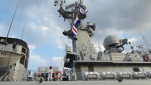 Chinese sailors are seen standing onboard a frigate berthed in Shanghai, in 2011. The Chinese navy is playing a key role in Beijing's move to become a major global military power, as demonstrated by the recent release of the first Chinese aircraft carrier