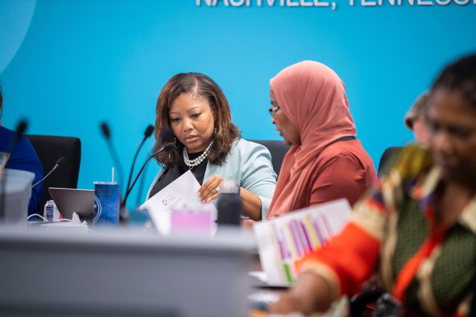 Director of MNPS Adrienne Battle looks over her notes during an MNPS Board of Education meeting on July 25.