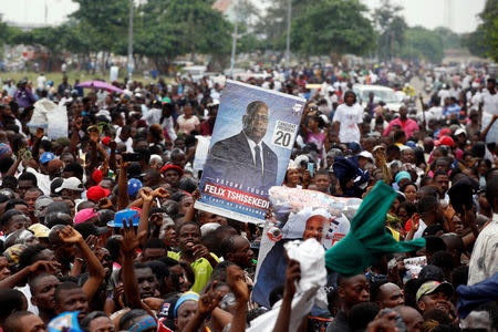 Supporters of Felix Tshisekedi, leader of the Congolese main opposition party, the Union for Democracy and Social Progress (UDPS) who was announced as the winner of the presidential elections, celebrate outside the party's headquarters in Kinshasa, Democratic Republic of Congo, January 10, 2019. REUTERS/Baz Ratner