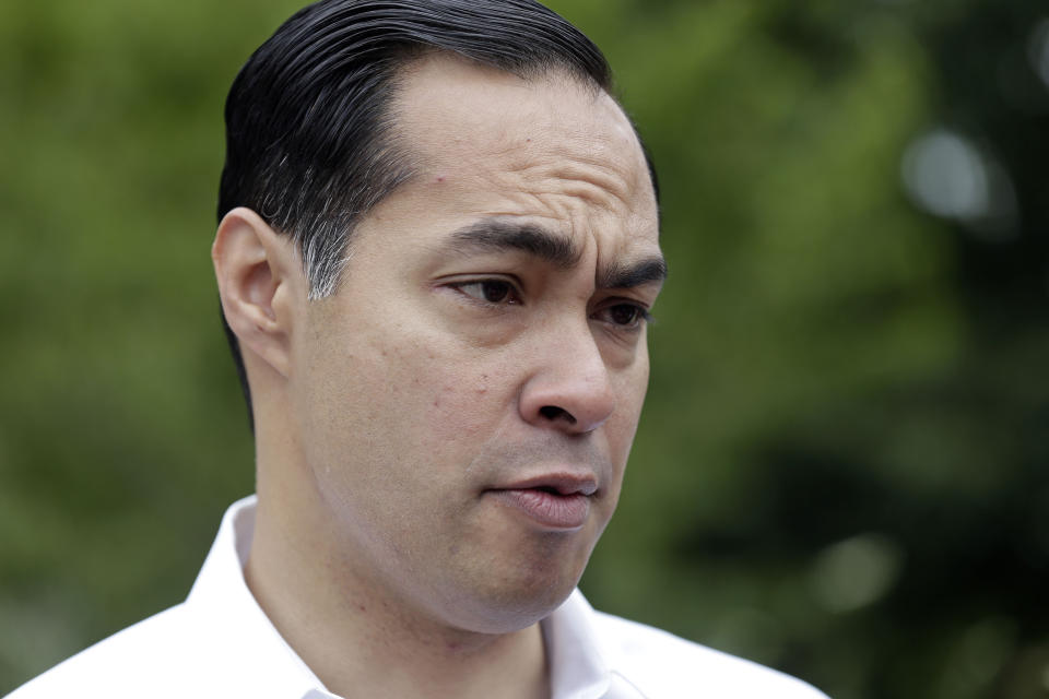 In this May 23, 2019, photo, Democratic presidential candidate and former U.S. Department of Housing and Urban Development Julian Castro speaks with a supporter before a rally with McDonald's employees and other activists in Durham, N.C. Hispanics are poised to help shape the 2020 Democratic primary in unprecedented ways. They comprise almost 30% of the population in the state that votes third in presidential primaries, Nevada. And the nation’s two largest Latino states, California and Texas, are among the 14 “Super Tuesday” states voting 10 just days later. (AP Photo/Gerry Broome)