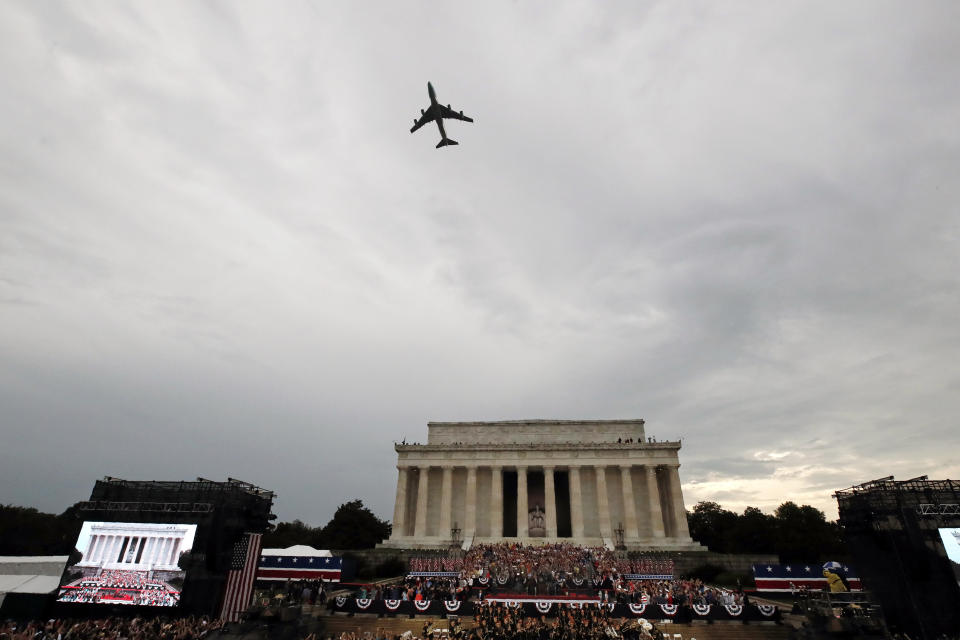 Special Air Mission 28000, Air Force One when the President is aboard, flies over Washington during an Independence Day celebration attended by President Donald Trump at the Lincoln Memorial, Thursday, July 4, 2019, in Washington. (AP Photo/Alex Brandon)