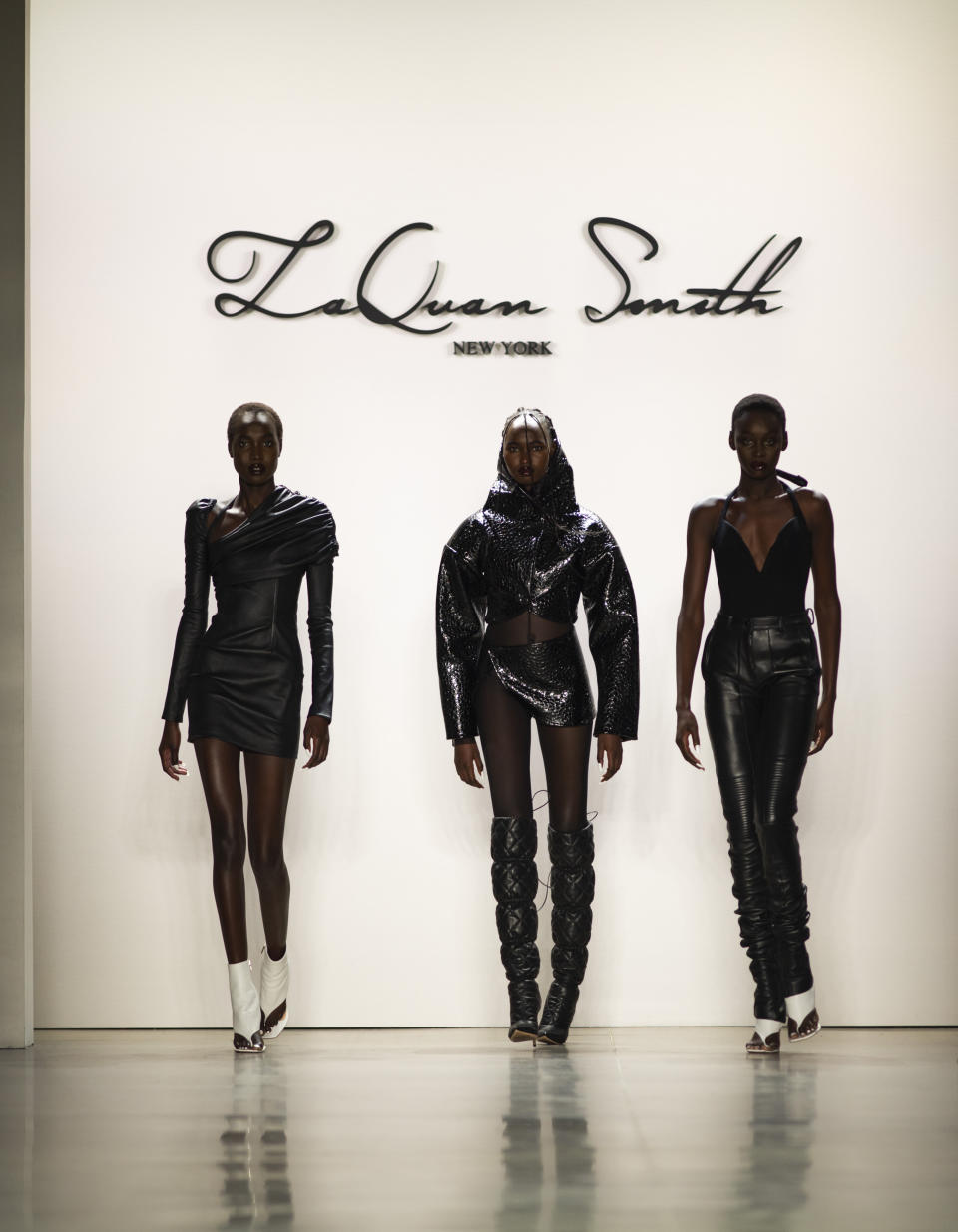 The LaQuan Smith collection is modeled during Fashion Week, Saturday, Feb. 8, 2020, in New York. (AP Photo/Eduardo Munoz Alvarez)