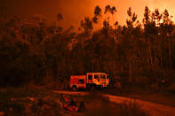 <p>A fire truck is shown during a wildfire at Penela, Coimbra, central Portugal, on June 18, 2017. (Patricia De Melo Moreira/AFP/Getty Images) </p>