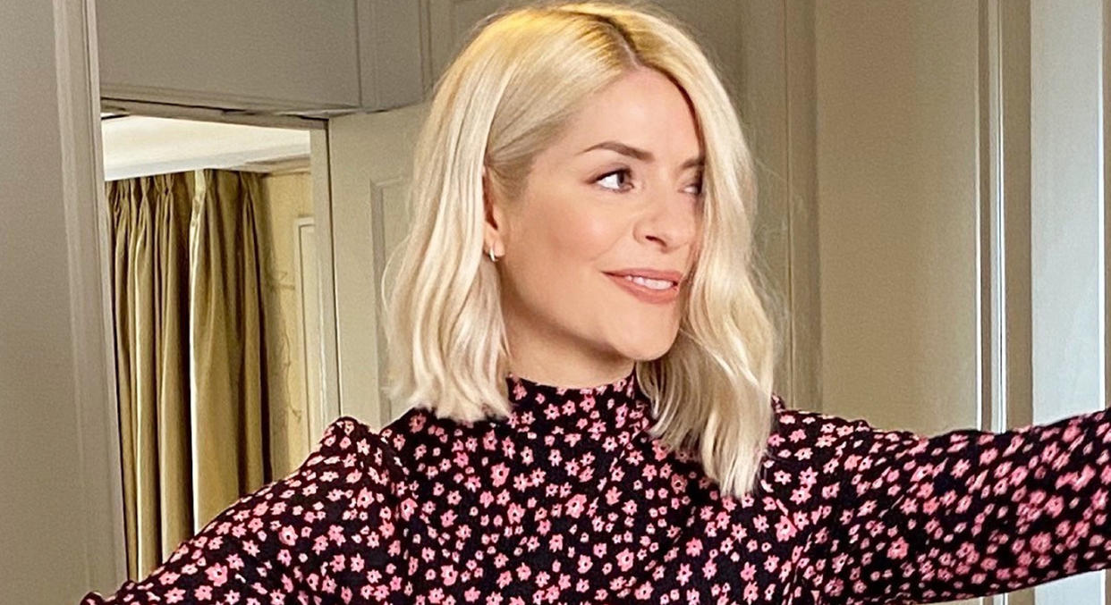 Holly Willoughby gives us style inspiration ahead of Valentine's Day in feminine floral Marks and Spencer's dress.  (Marks and Spencer)