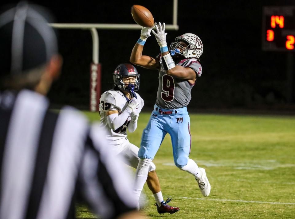 Rancho Mirage's Edward Johnson (9) pulls in a pass during the third quarter of their game in Rancho Mirage, Calif., Friday, Oct. 20, 2023.
