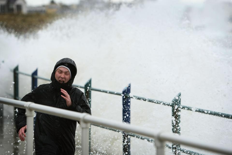 Parts of England will see well over half a month's rainfall on Friday (Christopher Furlong/Getty Images)