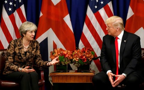 Theresa May and Donald Trump - Credit: Kevin Lamarque/REUTERS