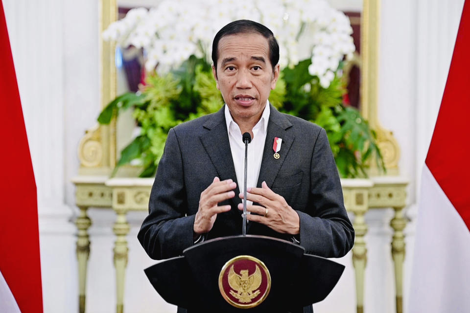 In this photo released by the Press and Media Bureau of the Indonesian Presidential Palace, Indonesian President Joko Widodo delivers his statement at Merdeka Palace in Jakarta, Indonesia, Tuesday, March 28, 2023. Widodo said Tuesday that his administration is trying to save the FIFA Under-20 World Cup following the cancelation of the official draw for group assignments in the youth soccer tournament, after regional governors and protesters demanded Israel's team be excluded. (Indonesian Presidential Palace via AP)