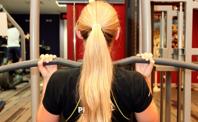 A personal trainer lifts weights at a Fitness First club. Picture: Michael O'Brien/The West Australian.