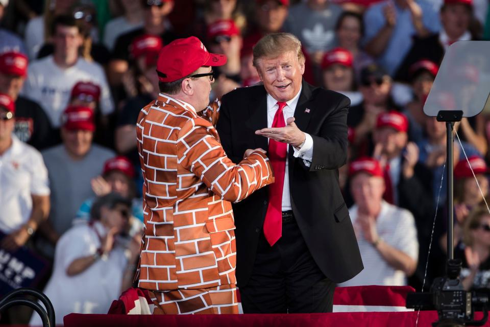 President Donald Trump, right, brings Blake Marnell on stage during a campaign rally in Montoursville, Pa., Monday, May 20, 2019.