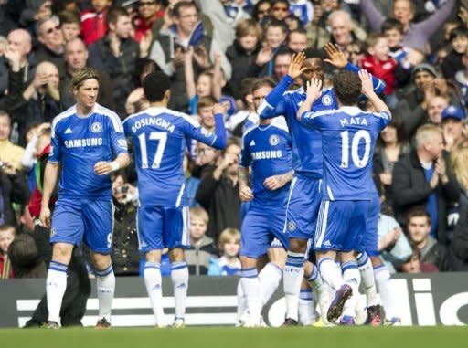 Chelsea's players celebrate during their FA Cup match against Leicester City in London. Fernando Torres scored twice to end a goal drought of nearly five months as Chelsea beat Leicester 5-2 on Sunday to become the first team into the semi-finals of this season's FA Cup