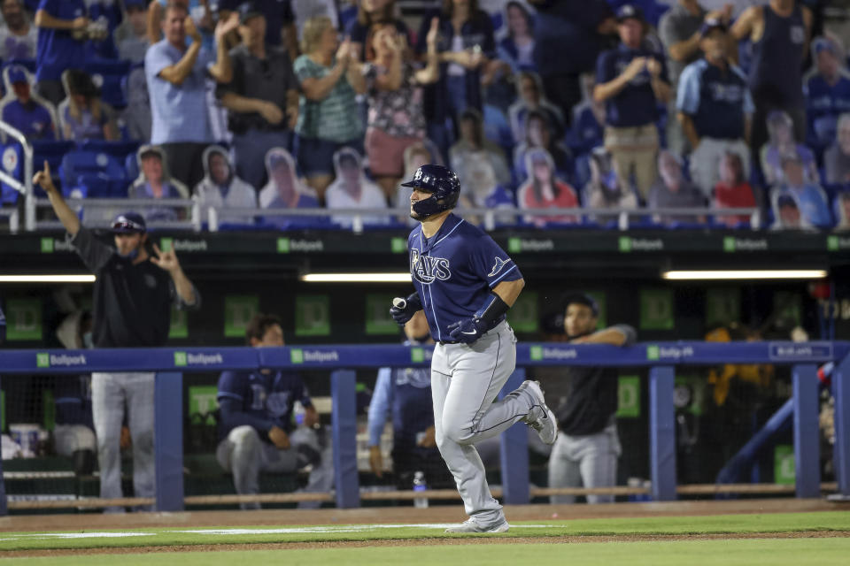 Tampa Bay Rays' Mike Zunino scores on a solo home run against the Toronto Blue Jays during the fifth inning of a baseball game Saturday, May 22, 2021, in Dunedin, Fla. (AP Photo/Mike Carlson)