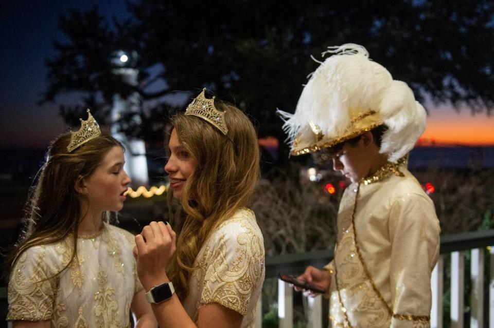 Kids dressed in krewe regalia at a Twelfth Night celebration at the Biloxi Welcome Center on Thursday, Jan. 5, 2023.