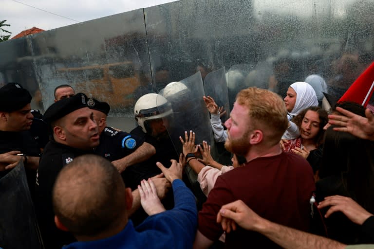 Palestinian Authority police prevent demonstrators from reaching the Canadian Representative Office in Ramallah in the occupied West Bank on April 30, 2024 (Jaafar ASHTIYEH)