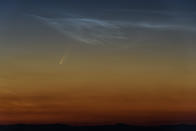 The Comet NEOWISE or C/2020 F3 is seen above Cered, Hungary, Monday, July 6, 2020. It passed closest to the Sun on 03 July and its closest approach to Earth will occur on 23 July. (Peter Komka/MTI via AP)