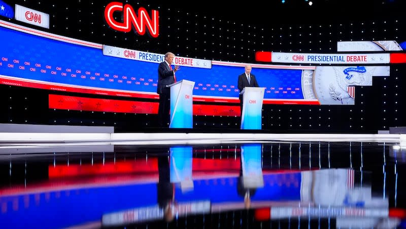 President Joe Biden, right, and Republican presidential candidate and former President Donald Trump, left, during a presidential debate hosted by CNN, Thursday, June 27, 2024, in Atlanta.