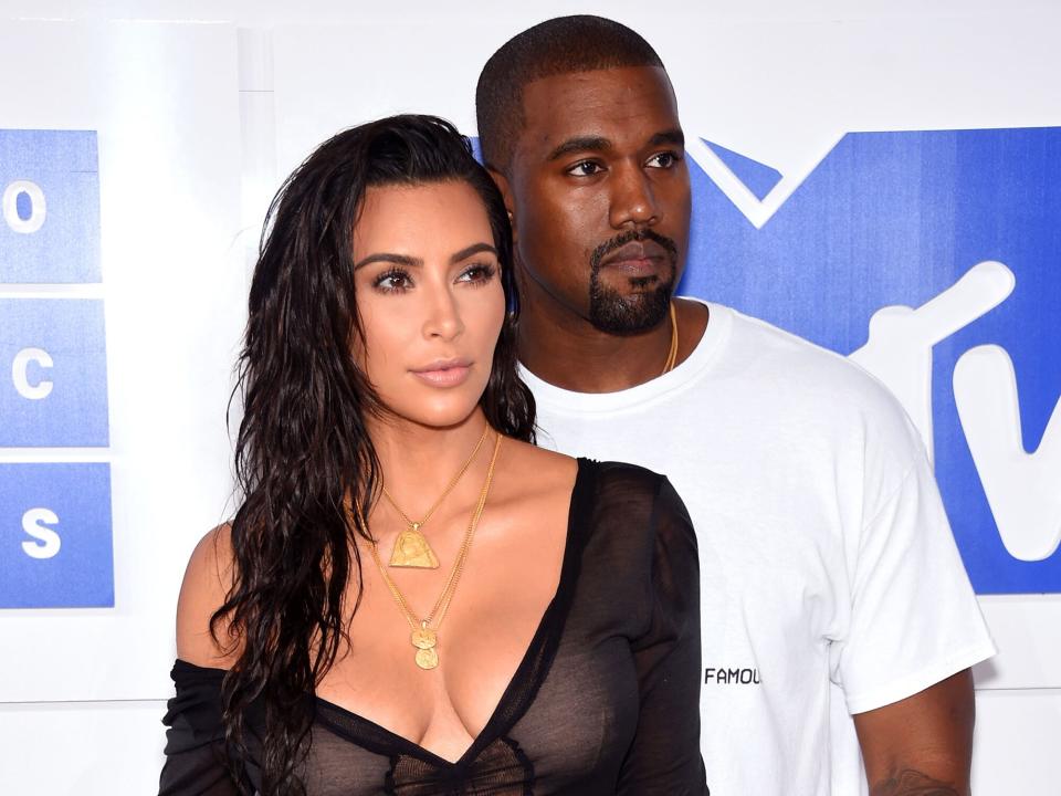 Kim Kardashian (L) and Kanye West attend the 2016 MTV Video Music Awards at Madison Square Garden on August 28, 2016 in New York City