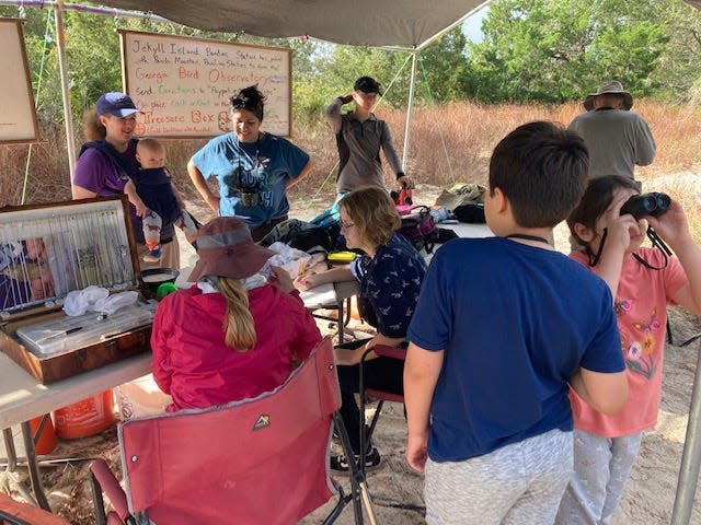 Jekyll Island Banding Station--collecting data and banding birds.