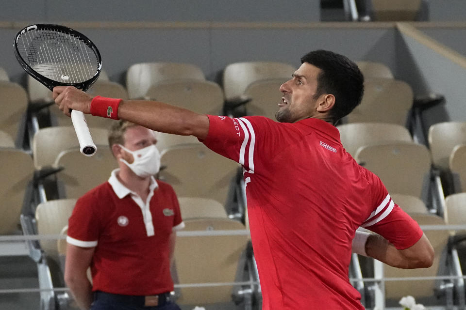 Serbia's Novak Djokovic reacts as he defeats Italy's Matteo Berrettini in a quarterfinal match of the French Open tennis tournament at the Roland Garros stadium Wednesday, June 9, 2021 in Paris. (AP Photo/Michel Euler)