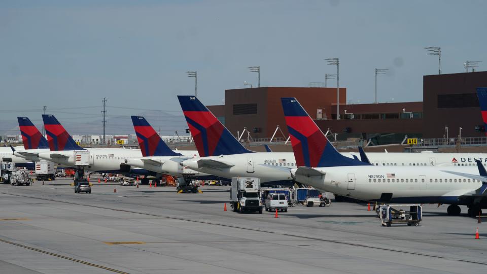 Delta Air Lines planes are shown at their gates at Salt Lake City International Airport Thursday, June 30, 2022, in Salt Lake City. (AP Photo/Rick Bowmer)