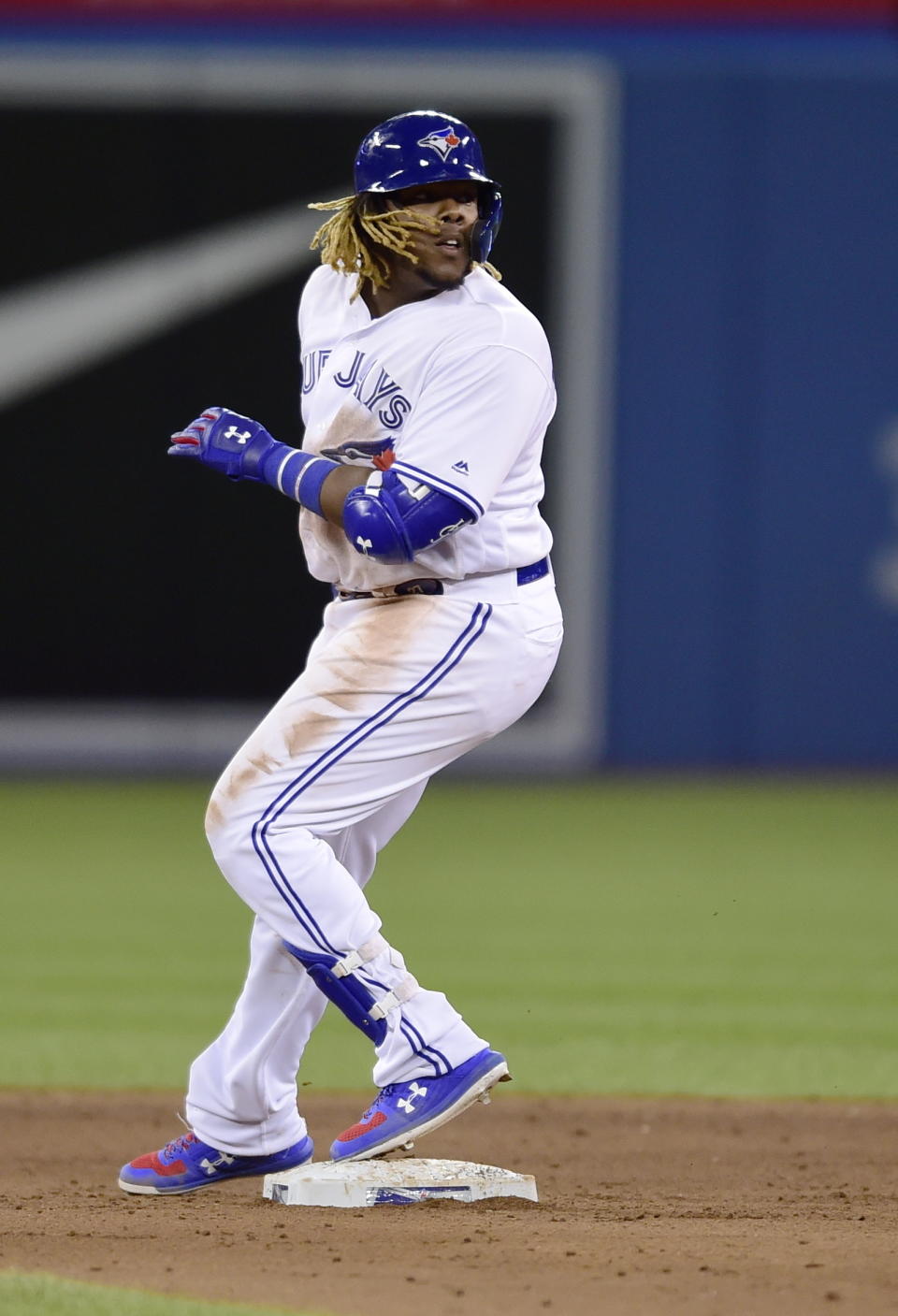 Toronto Blue Jays' Vladimir Guerrero Jr. is safe at second on a double against the Oakland Athletics during ninth-inning baseball game action in Toronto, Friday, April 26, 2019. (Frank Gunn/The Canadian Press via AP)