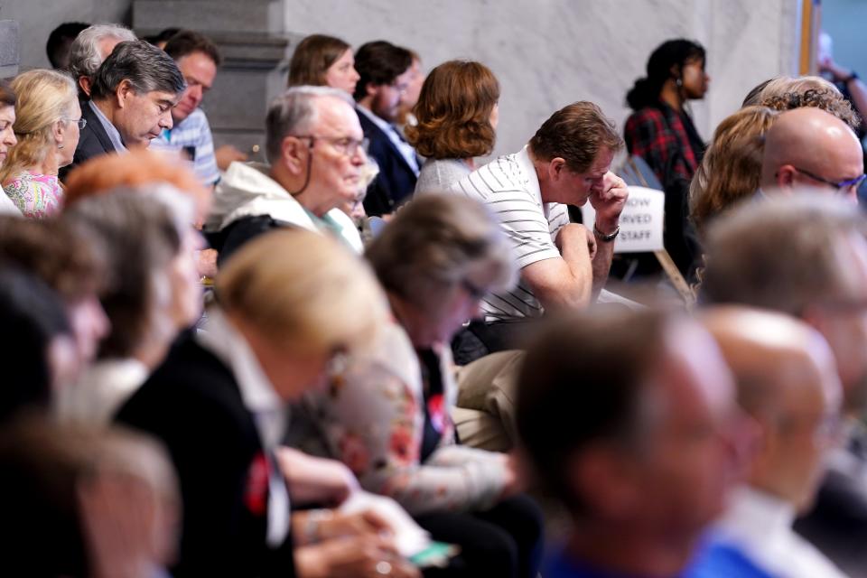 Members of the public listen to proceedings of the Cincinnati Planning Commission meets and hears public comment before voting on a zoning overhaul named Connected Communities, Friday, May 17, 2024, at City Hall in Cincinnati.