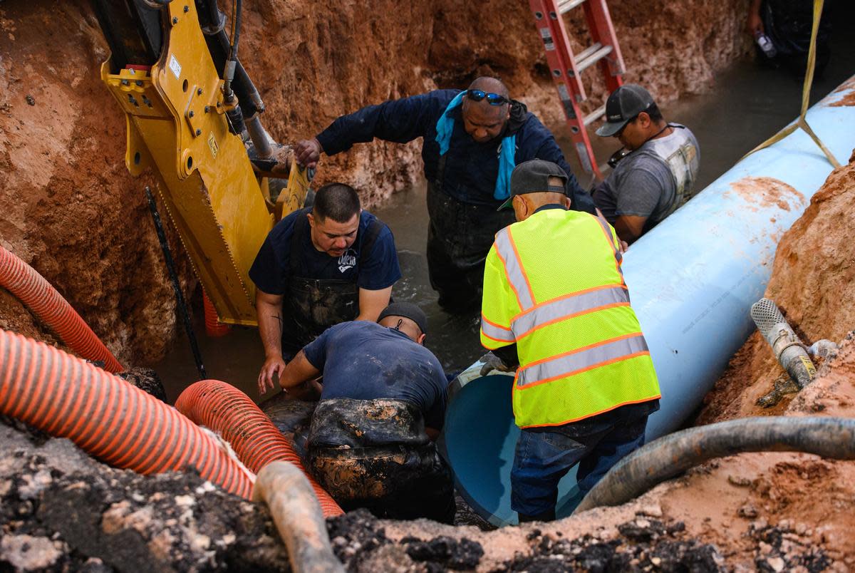 City of Odessa Water Distribution employees work through the night as they attempt to repair a broken water main on Tuesday, June 14, 2022 in Odessa. According to Mayor of Odessa Javier Joven, repairs were completed around 3:45 a.m. Wednesday.