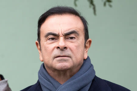 Renault CEO Carlos Ghosn waits for French President Emmanuel Macron for a visit of the Renault factory in Maubeuge, France, November 8, 2018. Etienne Laurent/Pool via REUTERS/Files