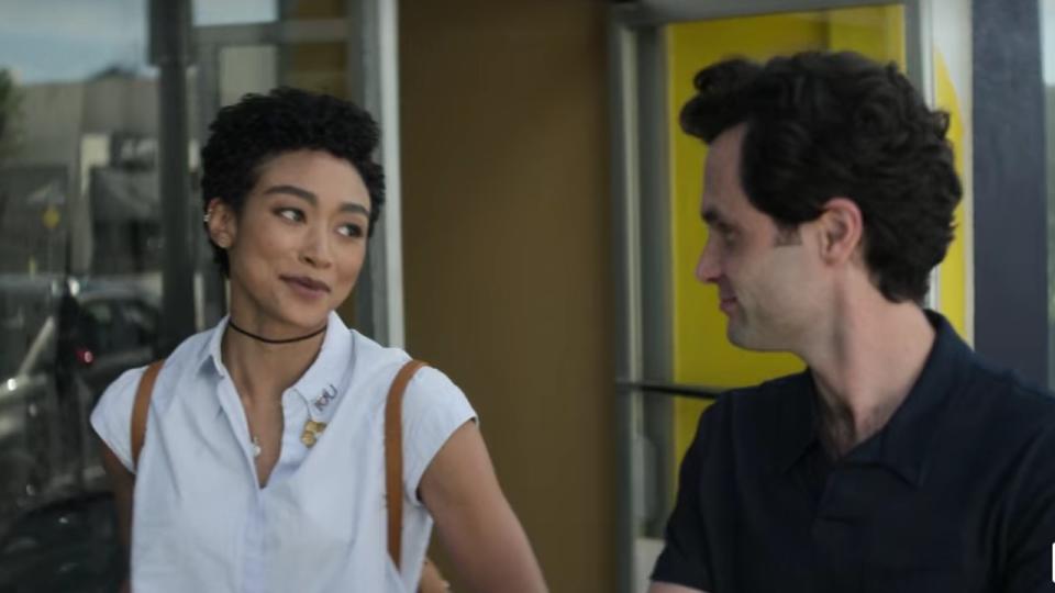 Tati Gabrielle and Penn Badgley in You