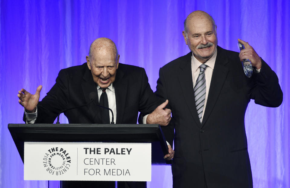 Honoree Carl Reiner, left, is joined by his son Rob Reiner as he accepts his award at "The Paley Honors: A Special Tribute to Television's Comedy Legends" at the Beverly Wilshire Hotel, Thursday, Nov. 21, 2019, in Beverly Hills, Calif. (Photo by Chris Pizzello/Invision/AP)