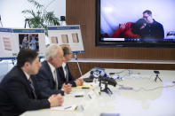 Joleen and Craig Dudek, top right, comfort each other as they join a news conference in Philadelphia via video, Monday, Jan. 6, 2020. IKEA has agreed to pay $46 million to the parents of their 2-year-old boy who died of injuries suffered when a 70-pound recalled dresser tipped over onto him, the family’s lawyers said Monday. (AP Photo/Matt Rourke)