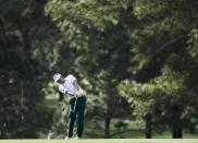 Ian Poulter, of England, hits to the 17th hole during the first round for the Masters golf tournament Thursday, April 11, 2019, in Augusta, Ga. (AP Photo/David J. Phillip)