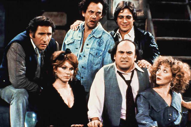 FilmPublicityArchive/United Archives/Getty (From left to right) Judd Hirsch, Marilu Henner, Christopher Lloyd, Danny DeVito, Tony Danza, and Carol Kane on 'Taxi'