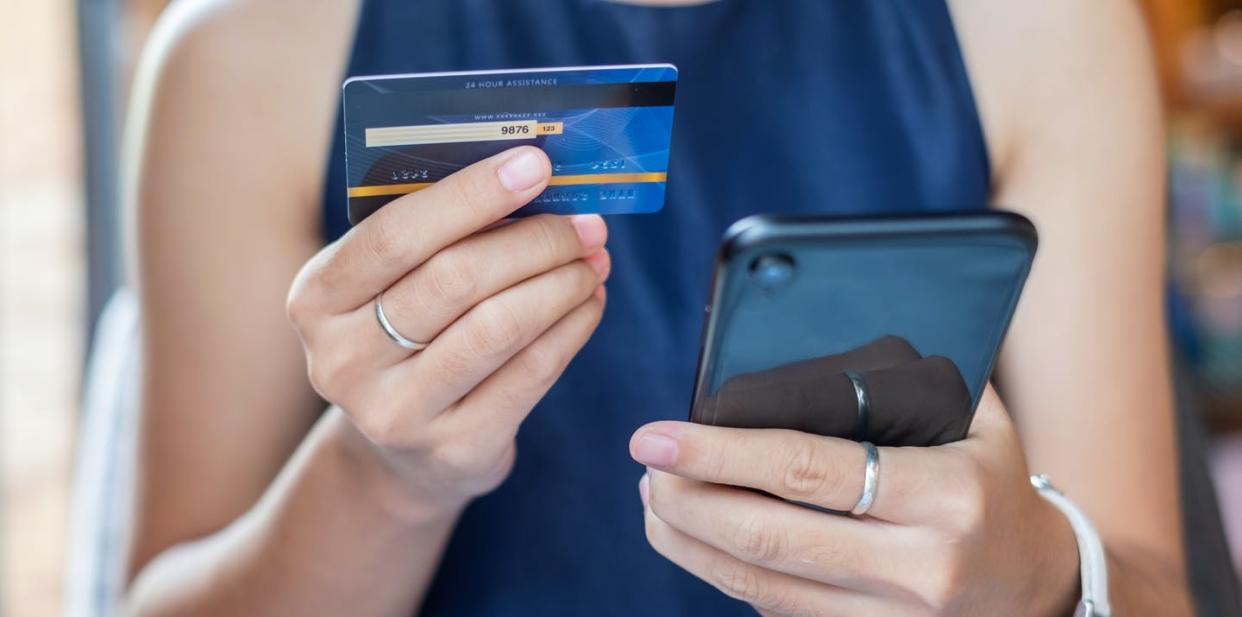 <span class="caption">Instagram encourages you to connect with things as much as with other people.</span> <span class="attribution"><a class="link " href="https://www.gettyimages.com/detail/photo/midsection-of-woman-holding-credit-card-while-using-royalty-free-image/1175003112?adppopup=true" rel="nofollow noopener" target="_blank" data-ylk="slk:Panuwat Dangsungnoen/EyeEm via Getty Images;elm:context_link;itc:0;sec:content-canvas">Panuwat Dangsungnoen/EyeEm via Getty Images</a></span>