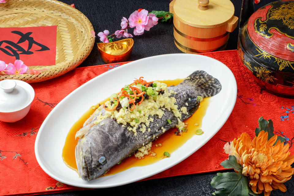 Steamed fish with soy sauce for Chinese New Year reunion dinner