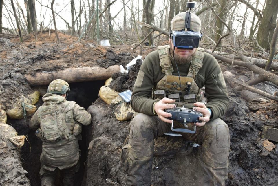 Soldatik piloting a FPV drone on the hunt for an enemy mortar position. (Photo via Bennett Murray)