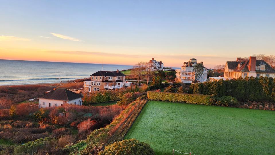 Conde Nast named Ocean House one of the top hotels in New England for 2023. The view from a room at sunrise shows why. That's Taylor Swift's oceanfront home in the background.