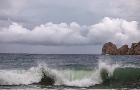 A general view shows waves crashing on the shore of La Empacadora beach in cabo San lucas as Hurricane Lorena churned close to the southern tip of Mexico's Baja California