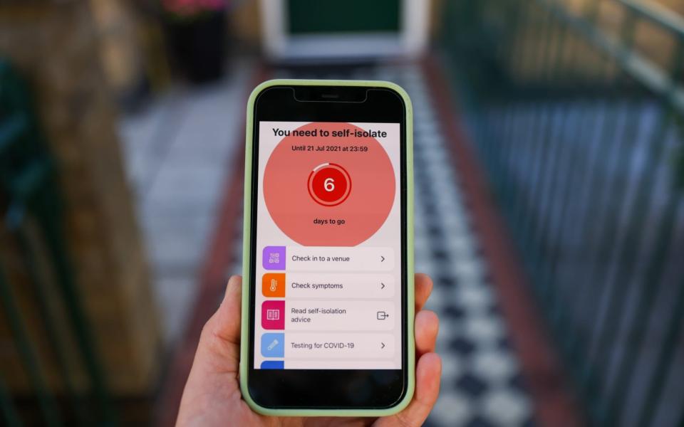 A "You need to self-isolate screen" on the NHS Covid-19 app - Hollie Adams /Bloomberg