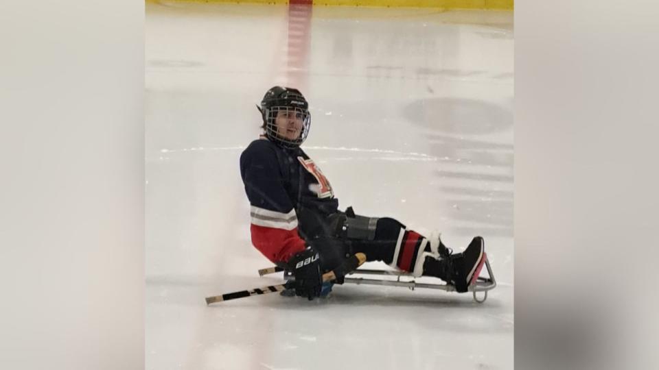 Hannah Corkum in her sled playing with the Acadia Minor Sledge hockey team. 