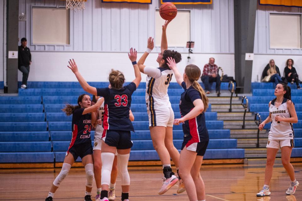 Lourdes' Bianka Velovic, center right, shoots during the girls basketball game at Our Lady of Lourdes High School in Poughkeepsie, NY on Saturday, December 9, 2023. Loudes defeated Kennedy 65-38. KELLY MARSH/FOR THE POUGHKEEPSIE JOURNAL