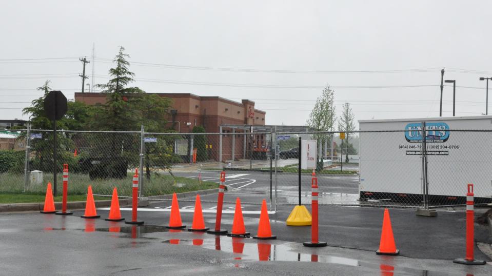The main entrance to the parking lot at the Middletown Chick-fil-A restaurant has been closed with cones and chain-link fencing, pictured here May 15.