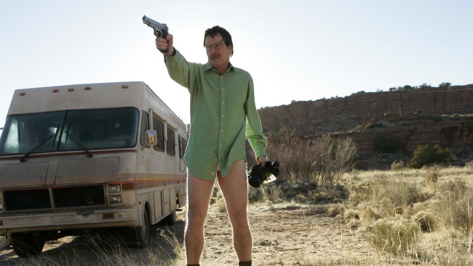 Bryan Cranston holding a gun while wearing no pants in Breaking Bad